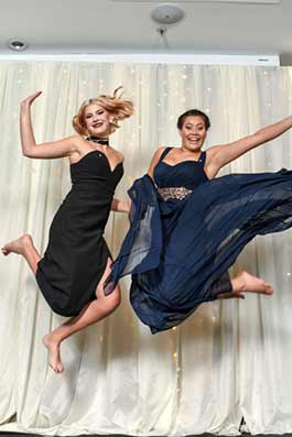 Girls leaping at Edgewater School Ball